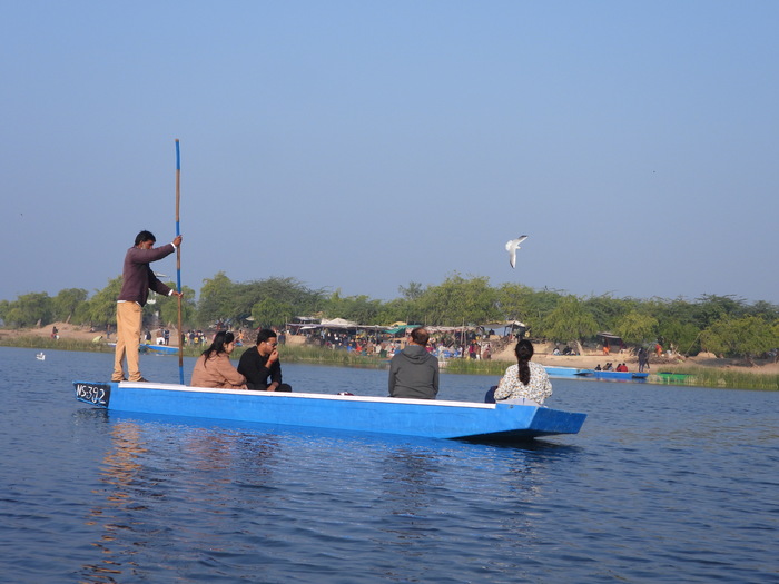 Tourists boating in Nal Sarovar Bird Sanctuary